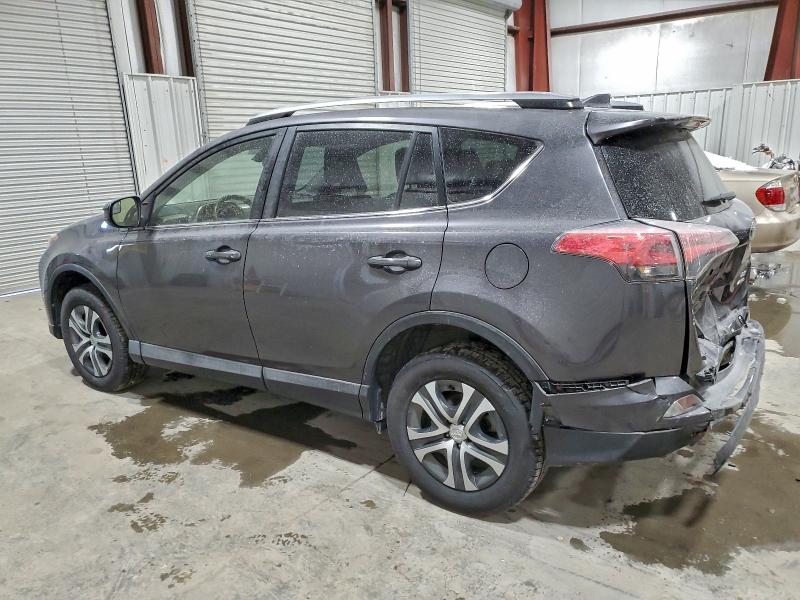 Photo 2 from auction – 2018 TOYOTA RAV4 LE with VIN JTMBFREV5JJ227003