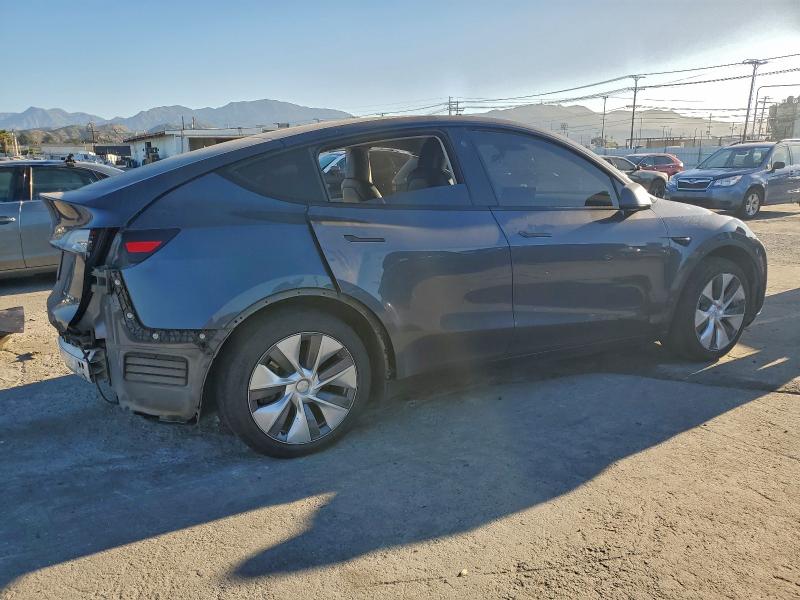 Photo 3 from auction – 2023 TESLA MODEL Y with VIN 7SAYGDEE2PA099412