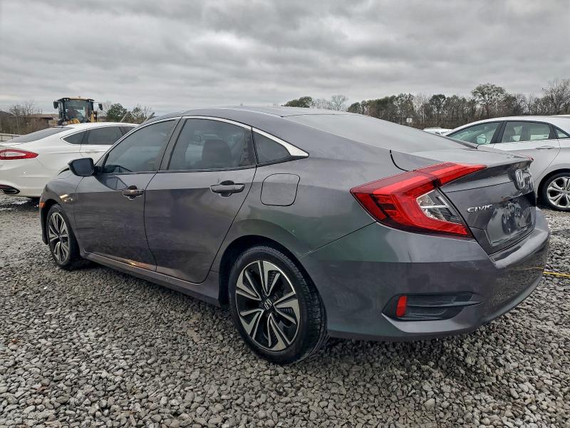 Photo 2 from auction – 2016 HONDA CIVIC LX with VIN 19XFC2F57GE048452