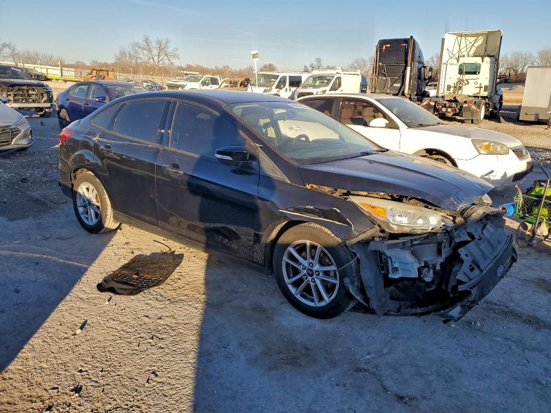 Photo 4 from auction – 2015 FORD FOCUS SE with VIN 1FADP3F21FL220087