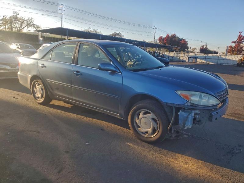 Photo 4 from auction – 2002 TOYOTA CAMRY with VIN JTDBE32K120083046