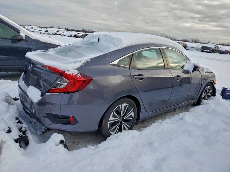 Photo 3 from auction – 2016 HONDA CIVIC with VIN 19XFC1F39GE041172