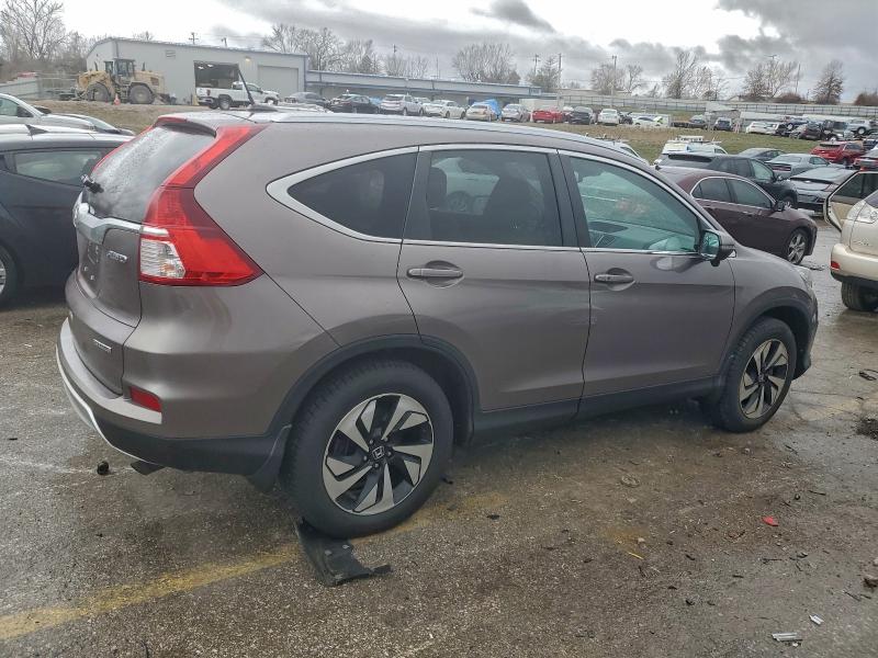 Photo 3 from auction – 2015 HONDA CRV with VIN 5J6RM4H9XFL059595