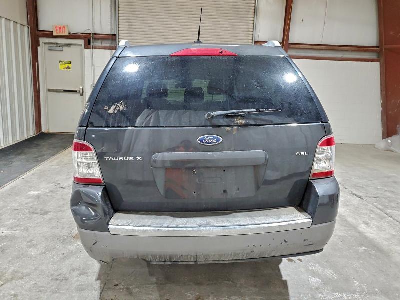 Photo 6 from auction – 2008 FORD TAURUS X S with VIN 1FMDK02W18GA03453