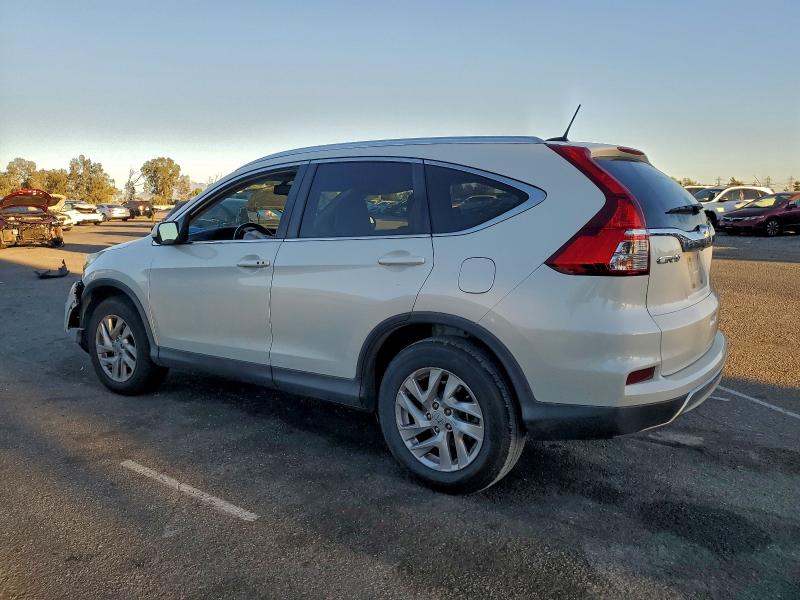 Photo 2 from auction – 2015 HONDA CR-V EXL with VIN 5J6RM3H79FL019016