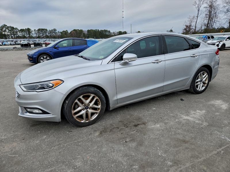 FORD FUSION TIT 2018 with VIN 3FA6P0D97JR138544 - Photo from auction