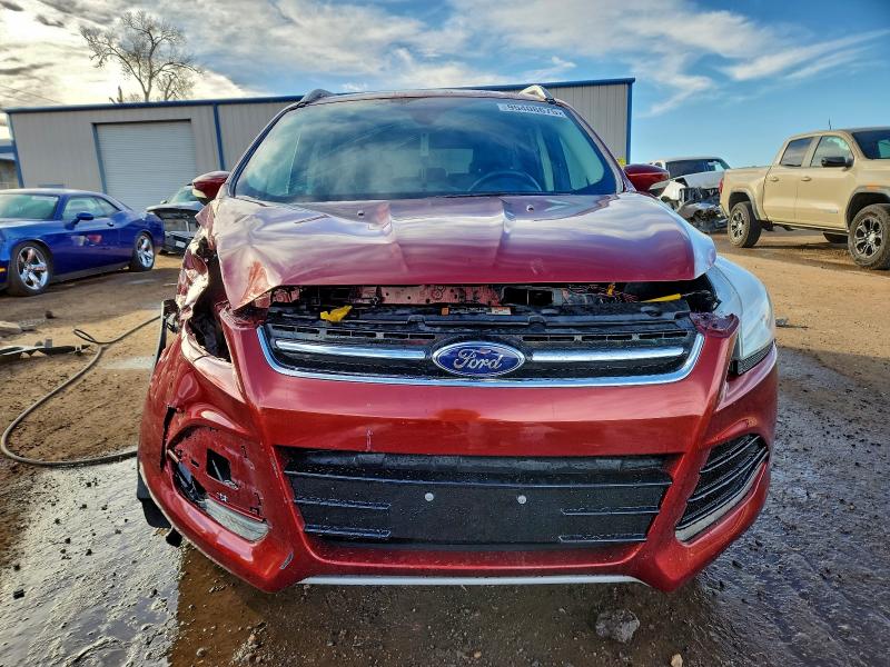 Photo 5 from auction – 2016 FORD ESCAPE TIT with VIN 1FMCU0J93GUC80476
