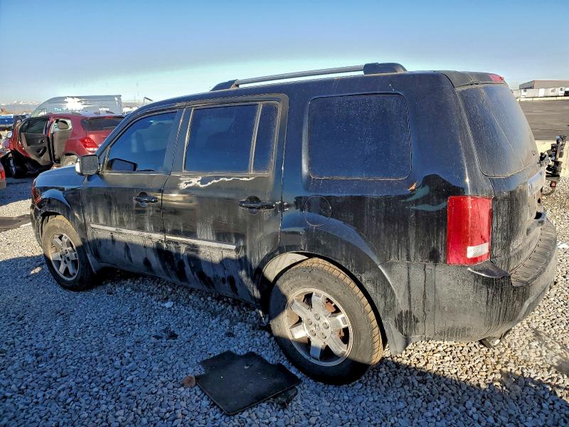 Photo 2 from auction – 2009 HONDA PILOT TOUR with VIN 5FNYF48999B015266