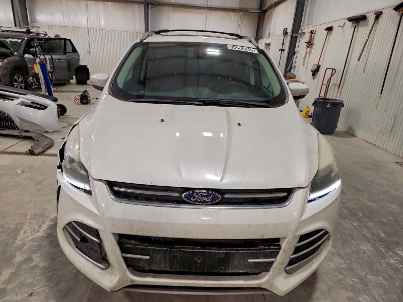 Photo 5 from auction – 2013 FORD ESCAPE TIT with VIN 1FMCU9J92DUA71925