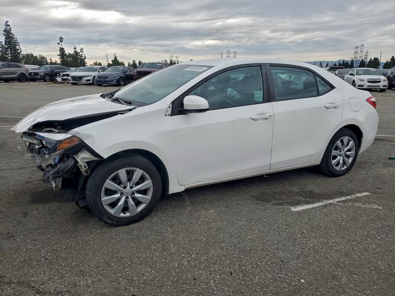 TOYOTA COROLLA L 2016 with VIN 5YFBURHE0GP546234 - Photo from auction