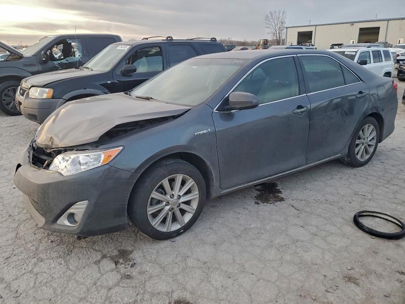 TOYOTA CAMRY HYBR 2012 with VIN 4T1BD1FK3CU041971 - Photo from auction