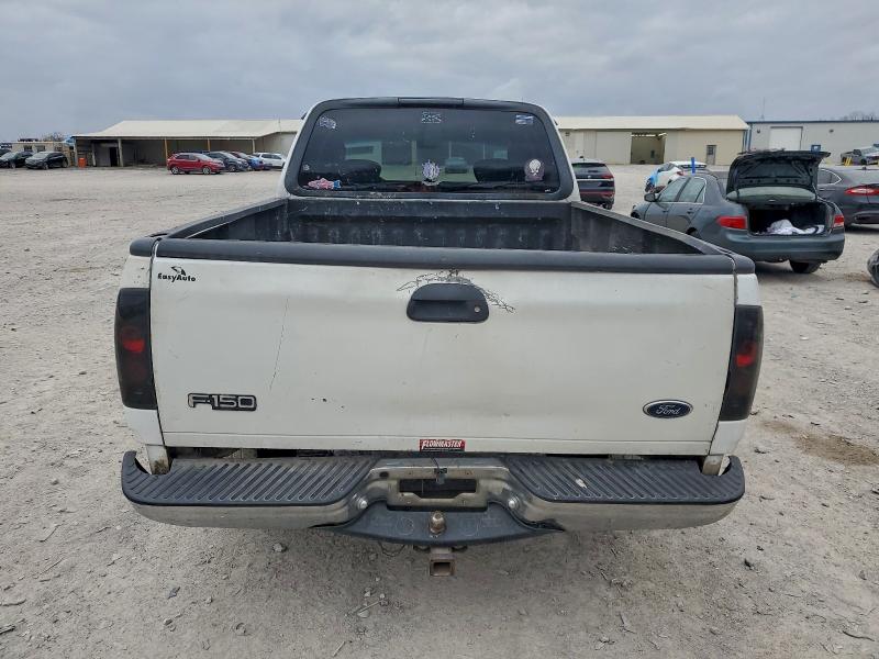 Photo 6 from auction – 2002 FORD F150 with VIN 1FTRX17WX2NB90804