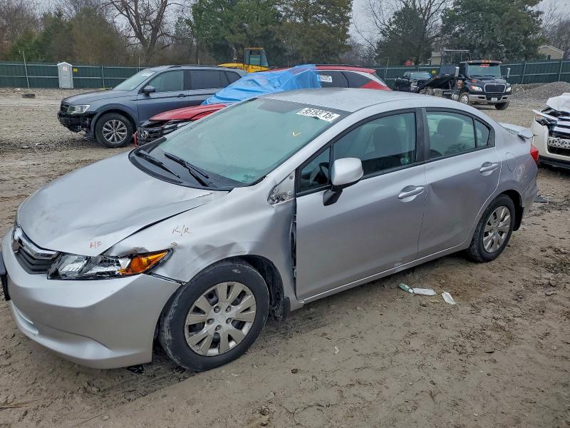 HONDA CIVIC LX 2012 with VIN 19XFB2F52CE013069 - Photo from auction