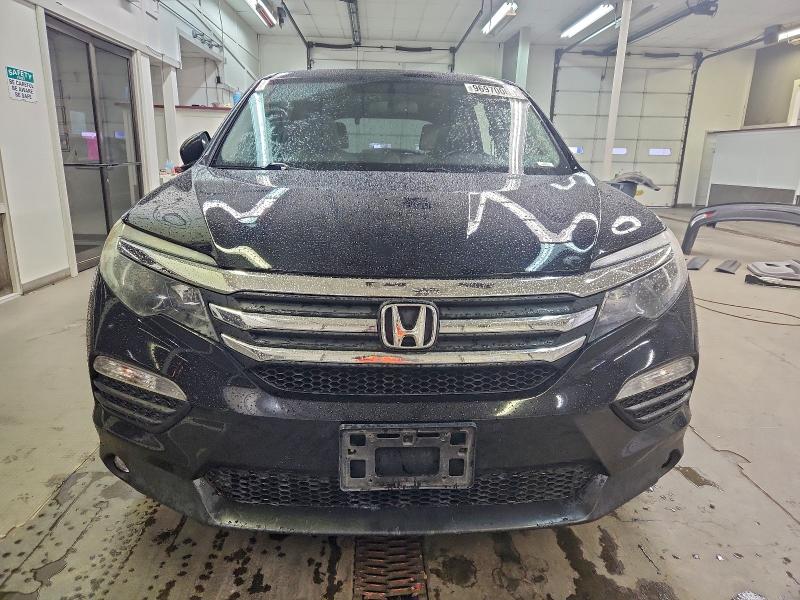 Photo 5 from auction – 2018 HONDA PILOT EXL with VIN 5FNYF6H53JB030620