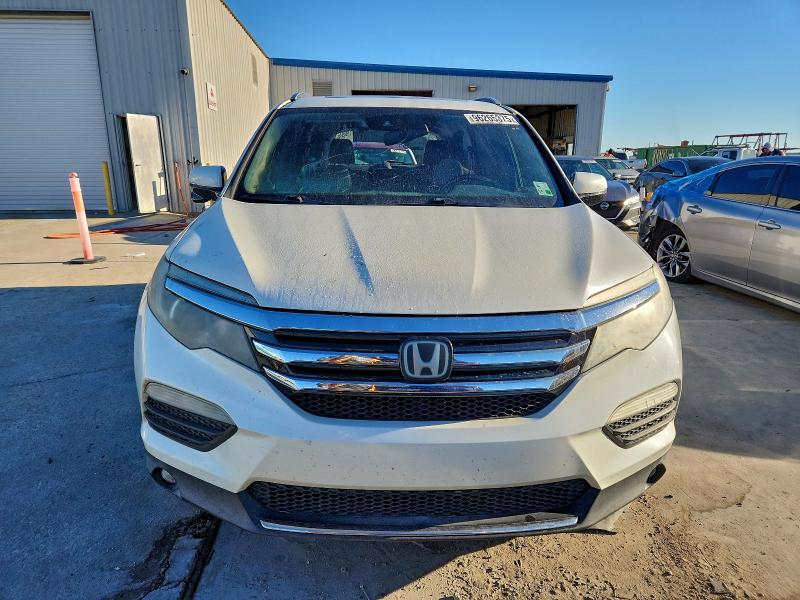 Photo 5 from auction – 2016 HONDA PILOT TOUR with VIN 5FNYF5H90GB039166