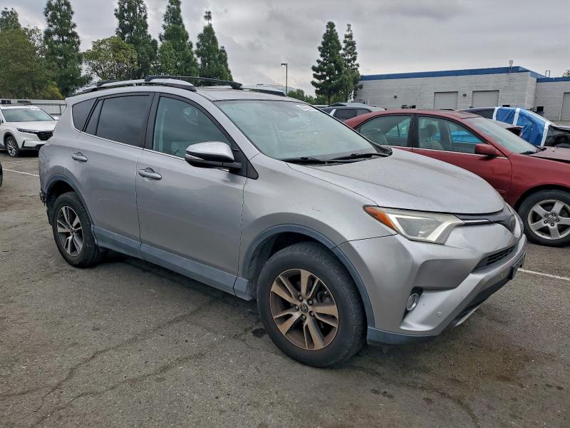 Photo 4 from auction – 2016 TOYOTA RAV4 XLE with VIN 2T3WFREV9GW298619