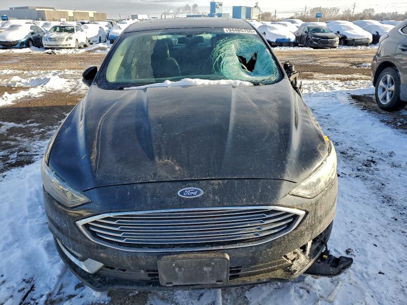 Photo 5 from auction – 2017 FORD FUSION SE with VIN 3FA6P0HDXHR141334