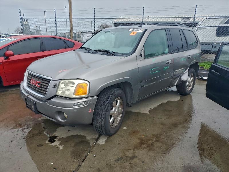 GMC ENVOY 2005 with VIN 1GKDT13S552113938 - Photo from auction