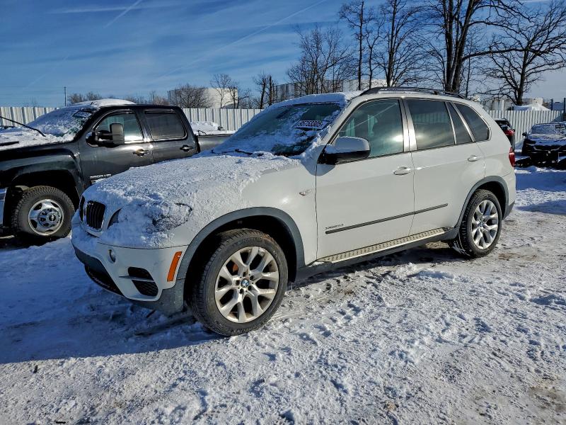 BMW X5 2013 with VIN 5UXZV4C58D0B01110 - Photo from auction