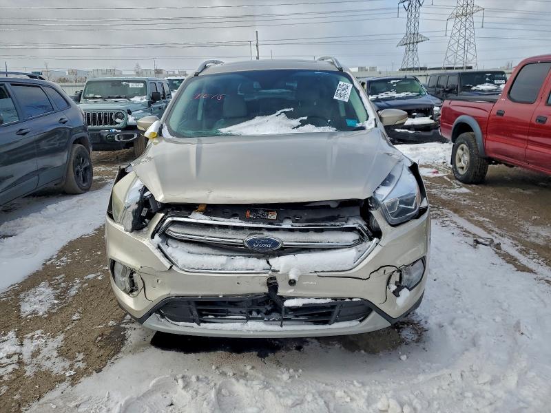 Photo 5 from auction – 2017 FORD ESCAPE TIT with VIN 1FMCU9J94HUE02493