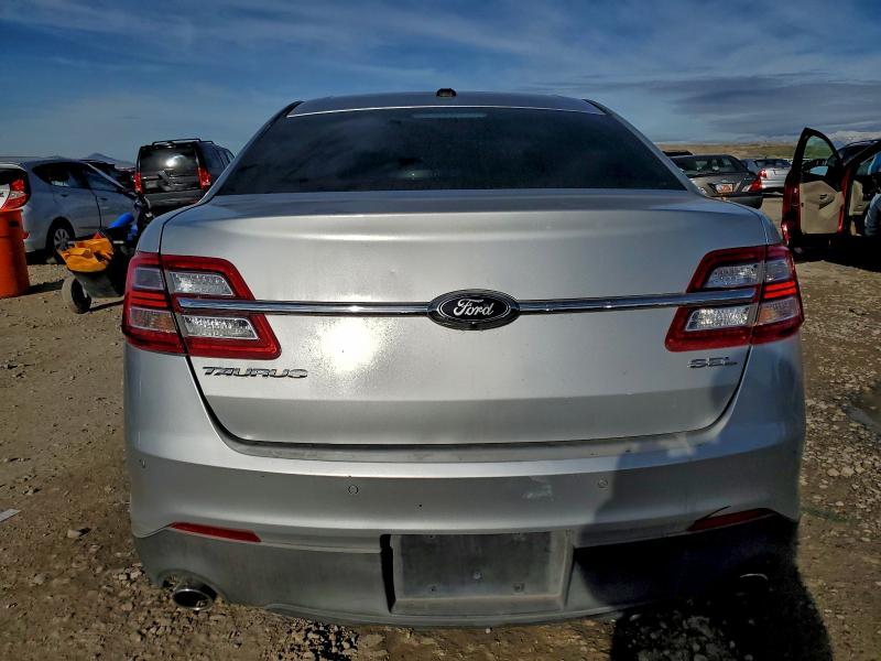 Photo 6 from auction – 2013 FORD TAURUS SEL with VIN 1FAHP2E80DG229774