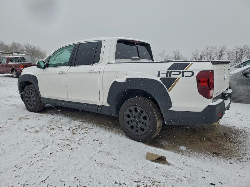 Photo 2 from auction – 2023 HONDA RIDGELINE with VIN 5FPYK3F58PB055686