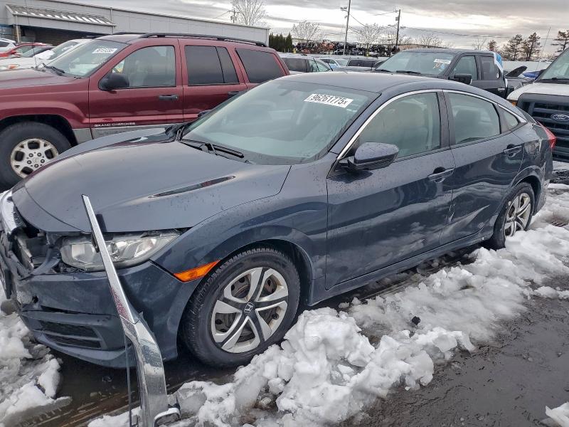 HONDA CIVIC LX 2017 with VIN 19XFC2F51HE223411 - Photo from auction