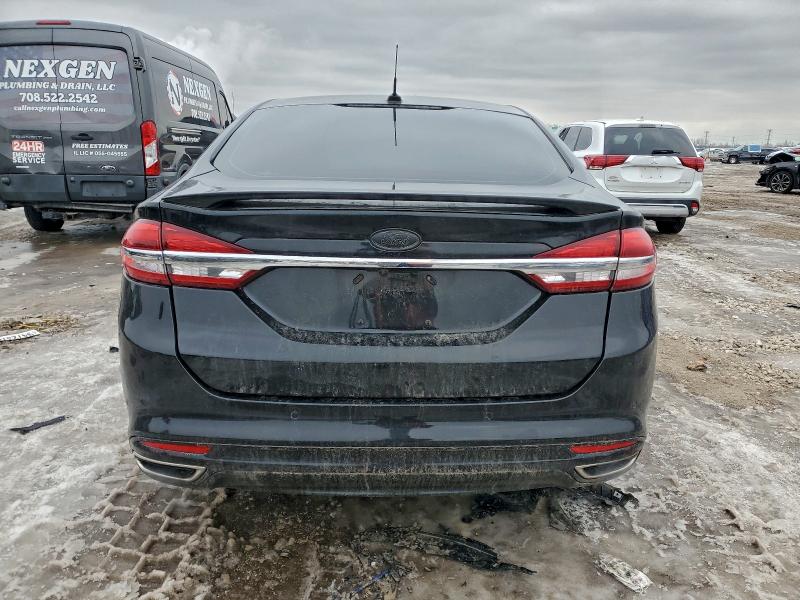 Photo 6 from auction – 2018 FORD FUSION TIT with VIN 3FA6P0K97JR166590