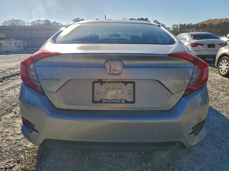 Photo 6 from auction – 2017 HONDA CIVIC LX with VIN 19XFC2F57HE040174