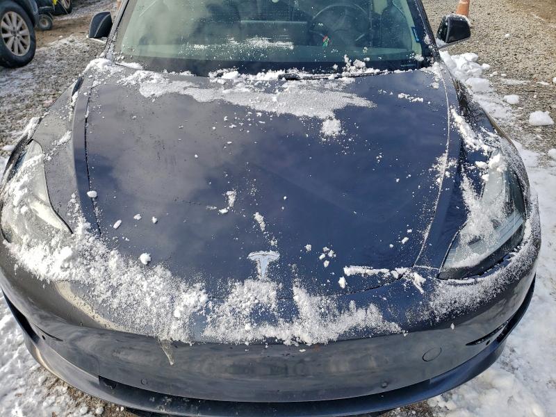 Photo 11 from auction – 2018 TESLA MODEL 3 with VIN 5YJ3E1EB2JF104104