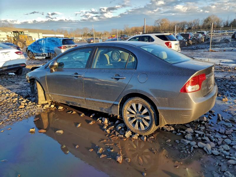 Photo 2 from auction – 2010 HONDA CIVIC EX with VIN 19XFA1F87AE031605