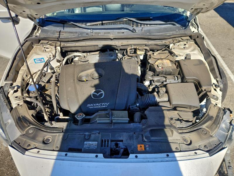 Photo 11 from auction – 2015 MAZDA 3 with VIN 3MZBM1W77FM226871