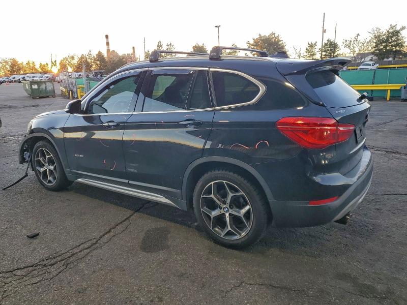 Photo 2 from auction – 2016 BMW X1 XDRIVE2 with VIN WBXHT3C30GP885256