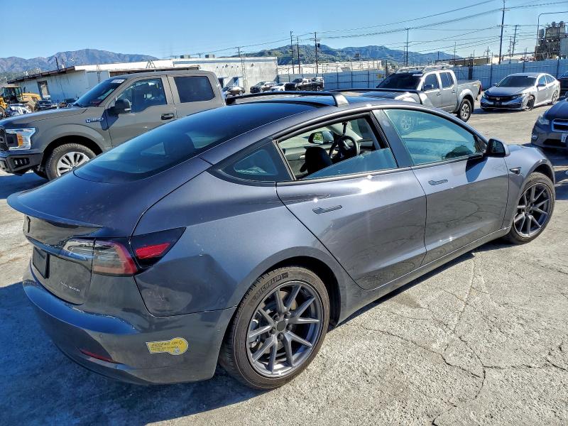 Photo 3 from auction – 2022 TESLA MODEL 3 with VIN 5YJ3E1EB3NF173406