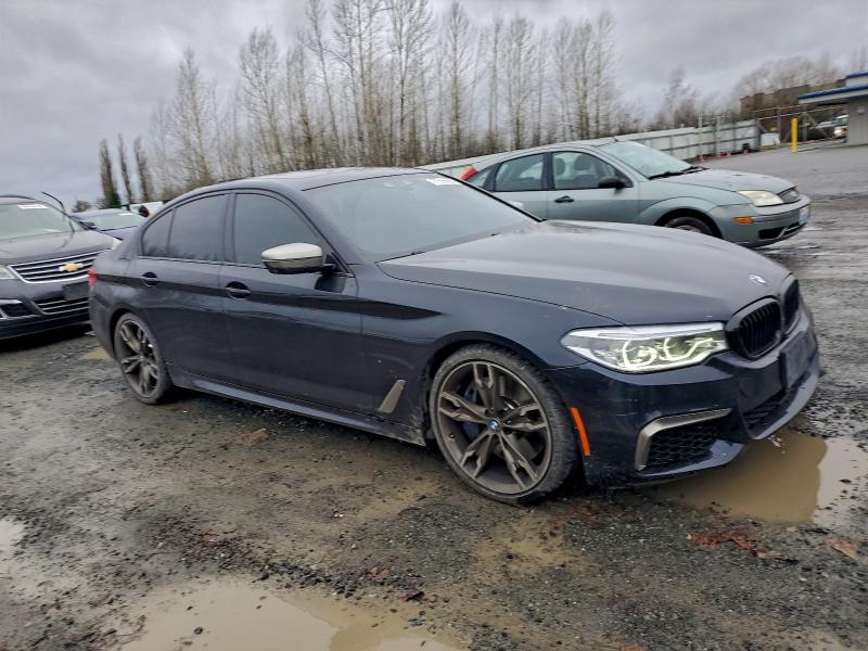 Photo 4 from auction – 2019 BMW M550XI with VIN WBAJB9C58KB287666