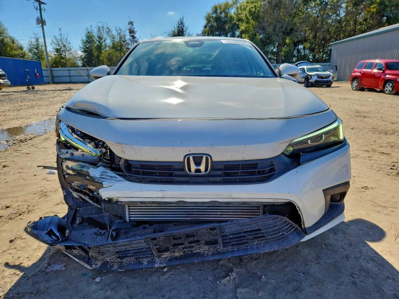 Photo 5 from auction – 2022 HONDA CIVIC EX with VIN 2HGFE1F77NH313458