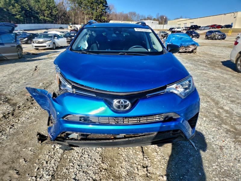 Photo 5 from auction – 2017 TOYOTA RAV4 LE with VIN JTMBFREV5HJ703969