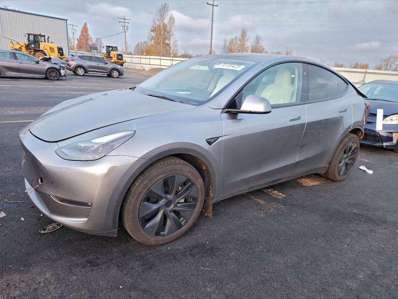 TESLA MODEL Y 2025 with VIN 7SAYGAEE8SF273882 - Photo from auction
