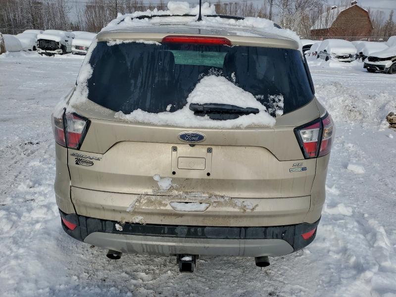 Photo 6 from auction – 2018 FORD ESCAPE with VIN 1FMCU9GD5JUA05408
