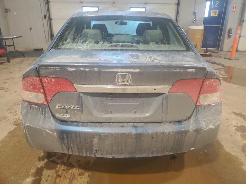 Photo 6 from auction – 2010 HONDA CIVIC DX with VIN 2HGFA1E23AH028669
