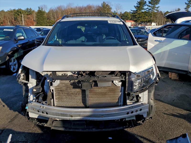 Photo 5 from auction – 2022 HONDA PASSPORT T with VIN 5FNYF8H60NB004552