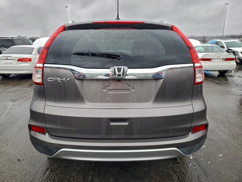 Photo 6 from auction – 2016 HONDA CR-V with VIN 2HKRM3H74GH502229