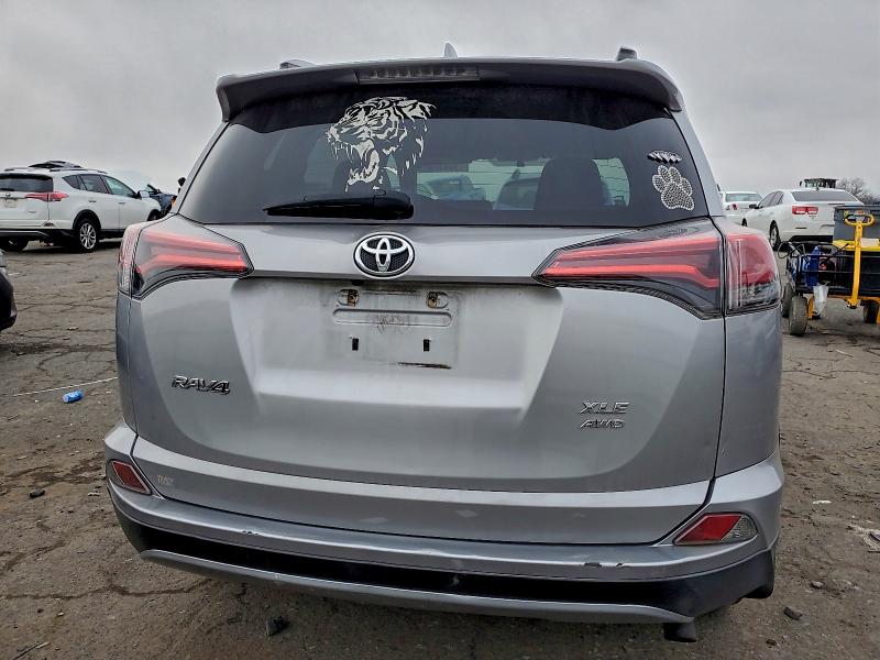 Photo 6 from auction – 2016 TOYOTA RAV4 XLE with VIN 2T3RFREV9GW476056