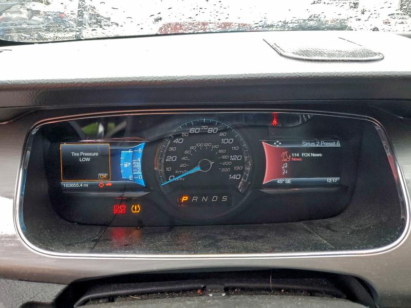 Photo 9 from auction – 2015 FORD TAURUS with VIN 1FAHP2E87FG121574