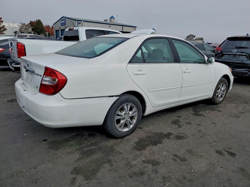 Photo 3 from auction – 2004 TOYOTA CAMRY LE with VIN 4T1BF30KX4U081268