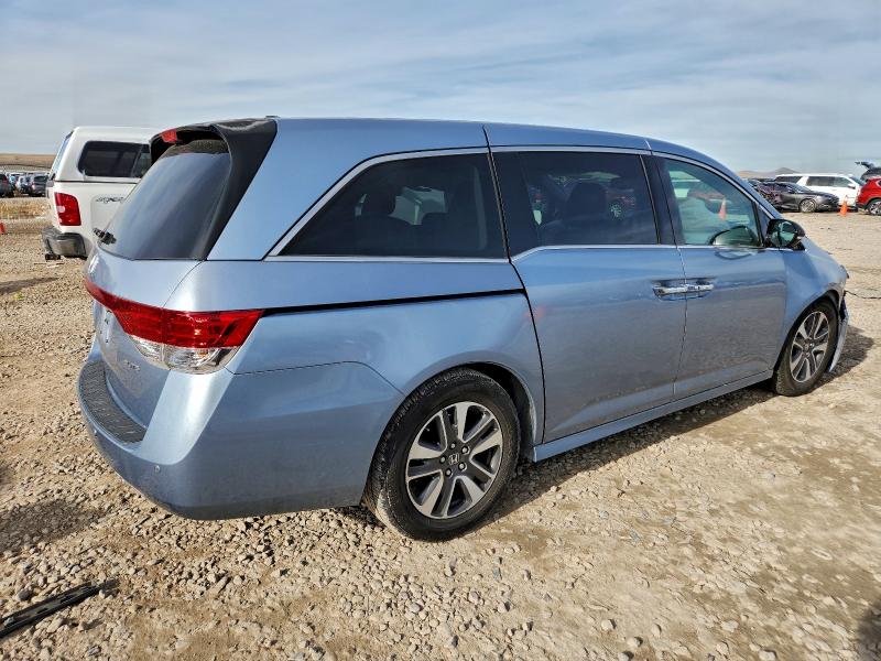 Photo 3 from auction – 2014 HONDA ODYSSEY with VIN 5FNRL5H99EB084956
