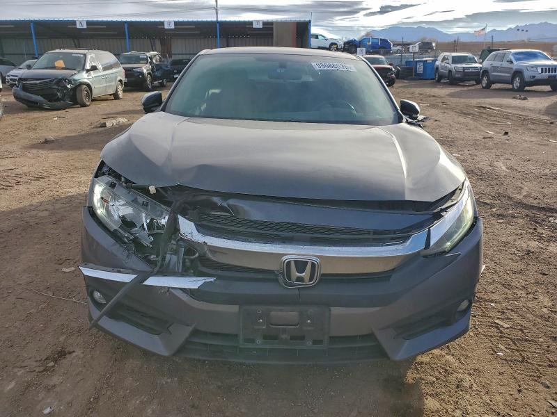 Photo 5 from auction – 2018 HONDA CIVIC with VIN 2HGFC3B3XJH354326