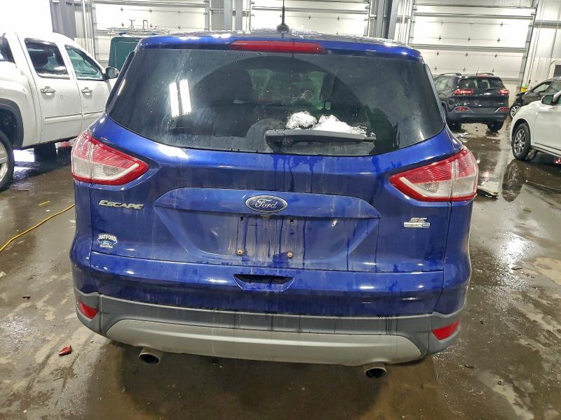 Photo 6 from auction – 2016 FORD ESCAPE SE with VIN 1FMCU9GX8GUC11597