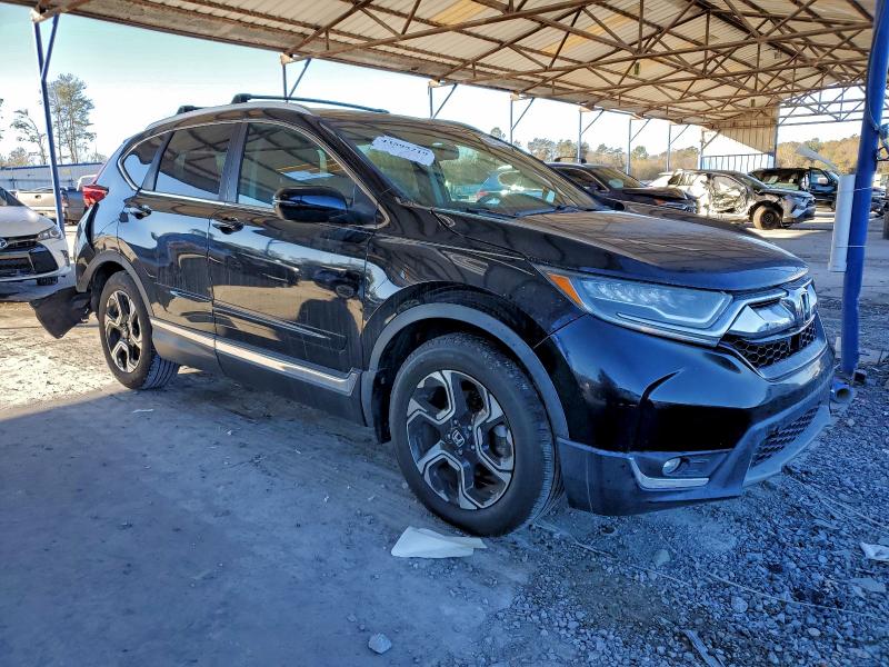 Photo 4 from auction – 2018 HONDA CR-V TOURI with VIN 7FARW1H99JE032046