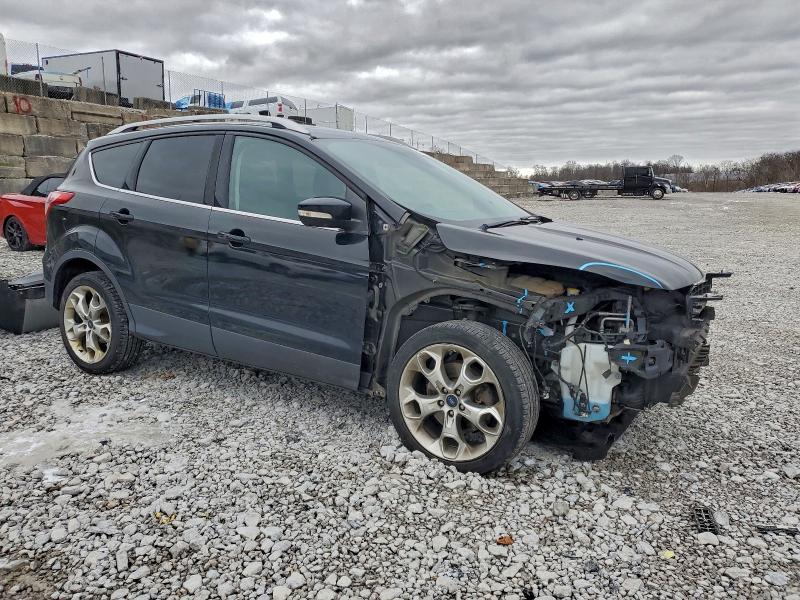 Photo 4 from auction – 2016 FORD ESCAPE TIT with VIN 1FMCU9J93GUB21641